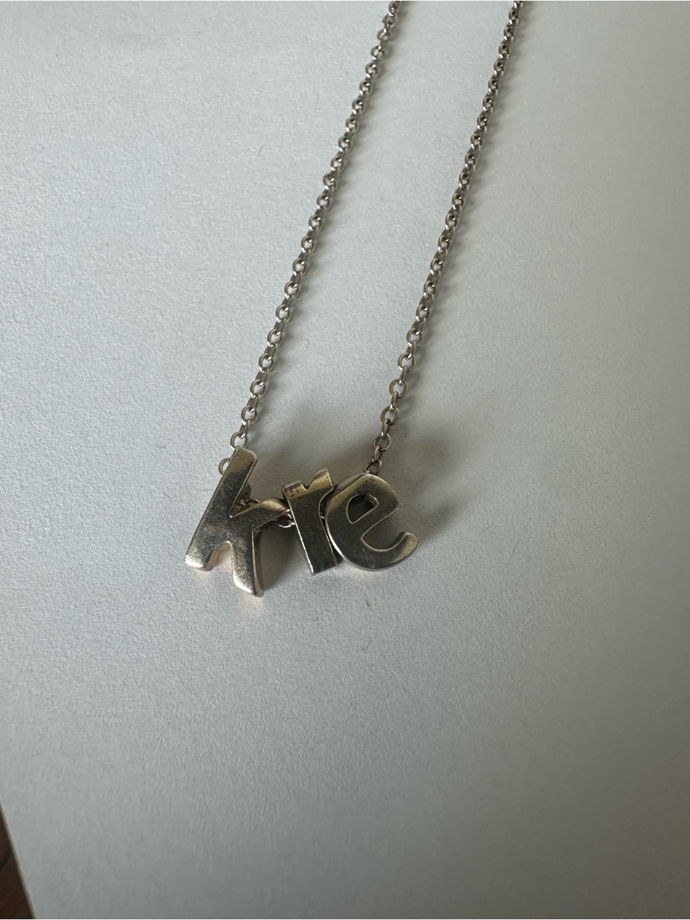 Gold  'Kre' Letter Pendant Necklace
